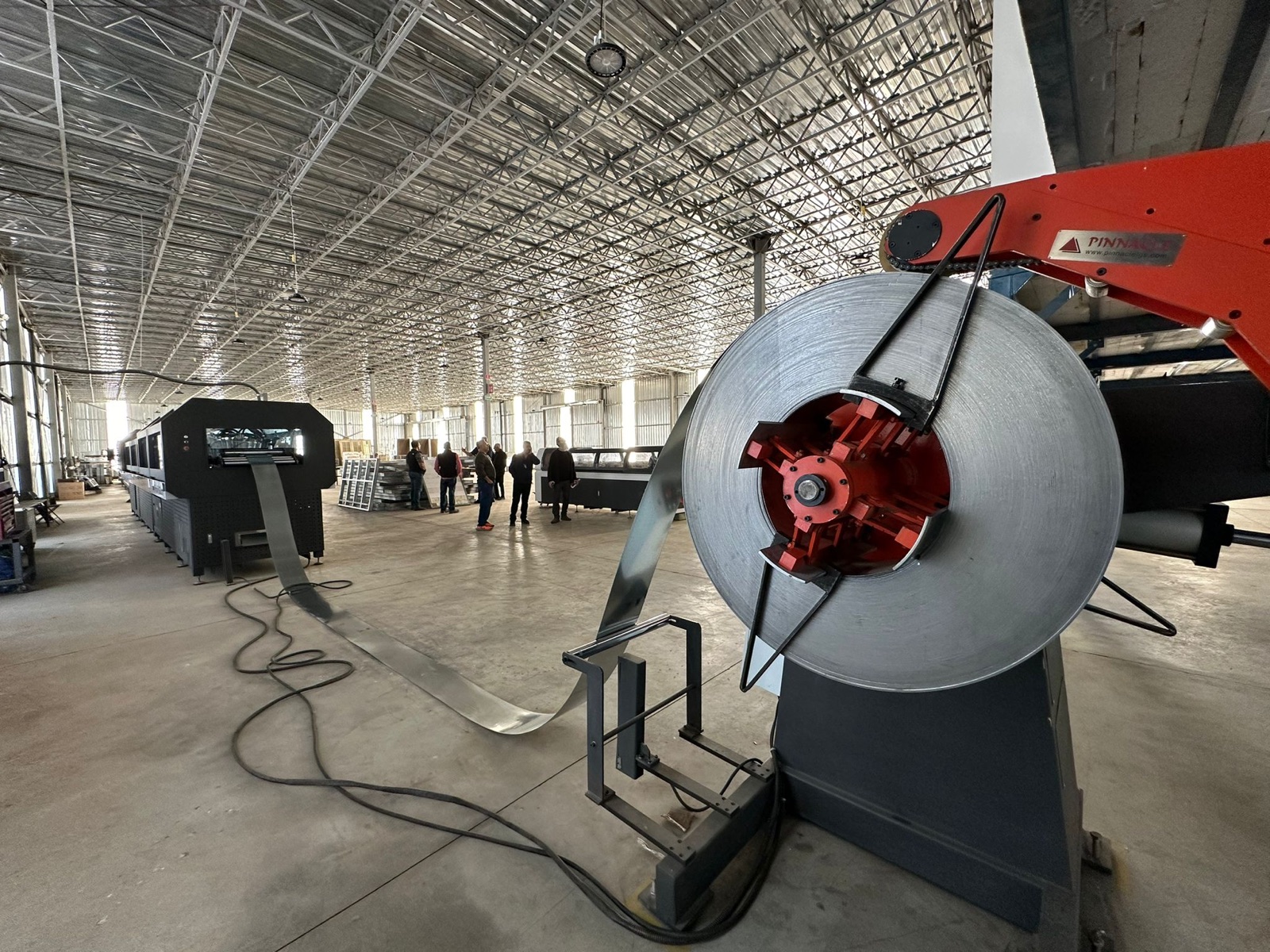 Roll-forming and fabrication equipment at the Cal Steel facility.
