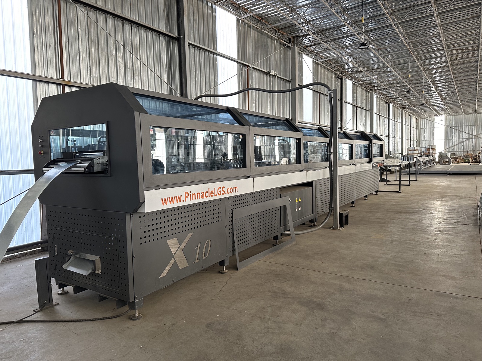 The Pinnacle X10 Infinity roll-forming line on the Cal Steel production floor