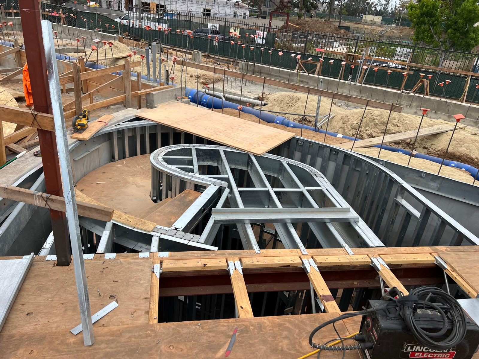 The custom curved stair system framed in steel at 777 Ocampo