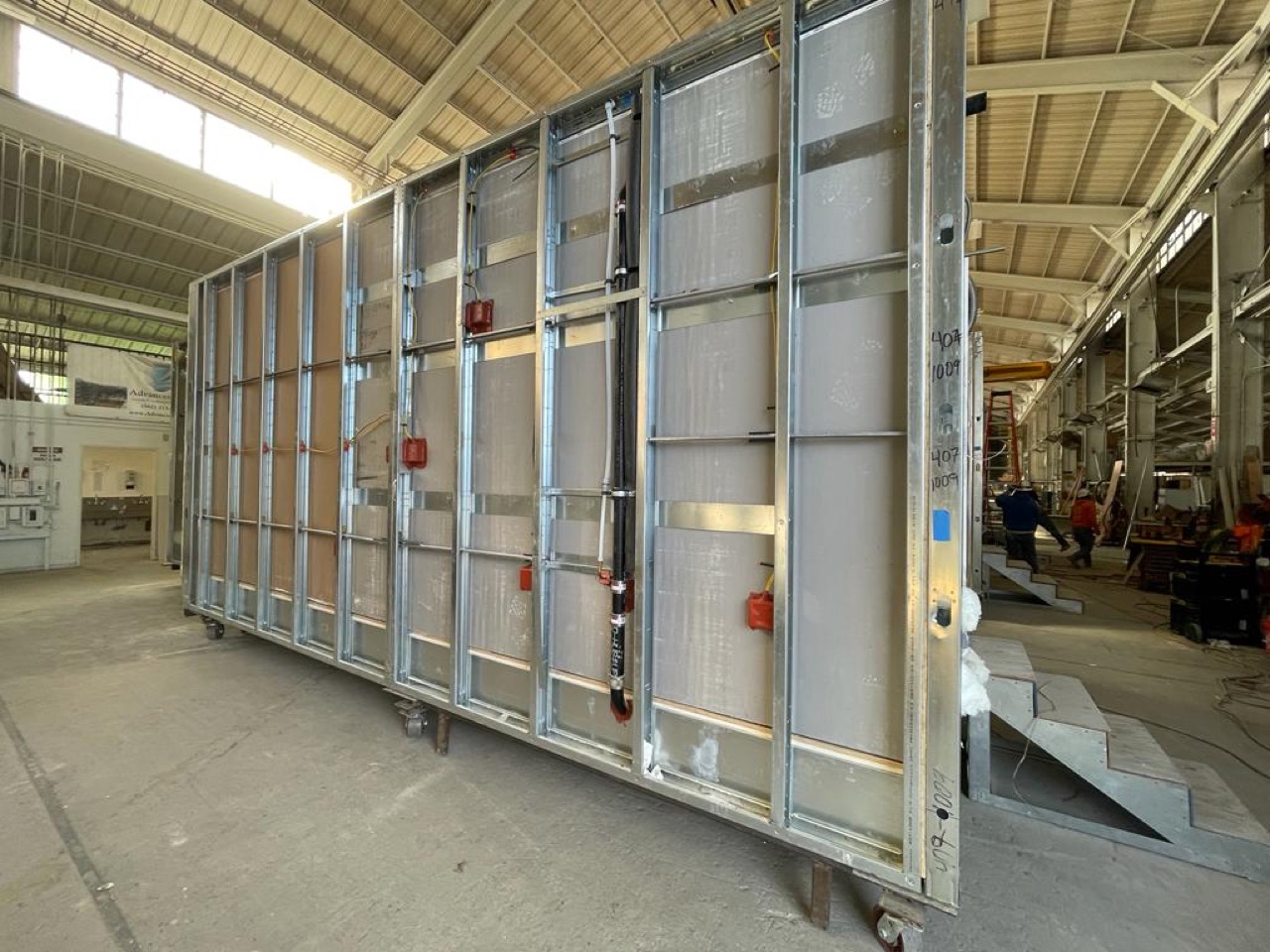 A complete volumetric module on casters, ready to move through the factory